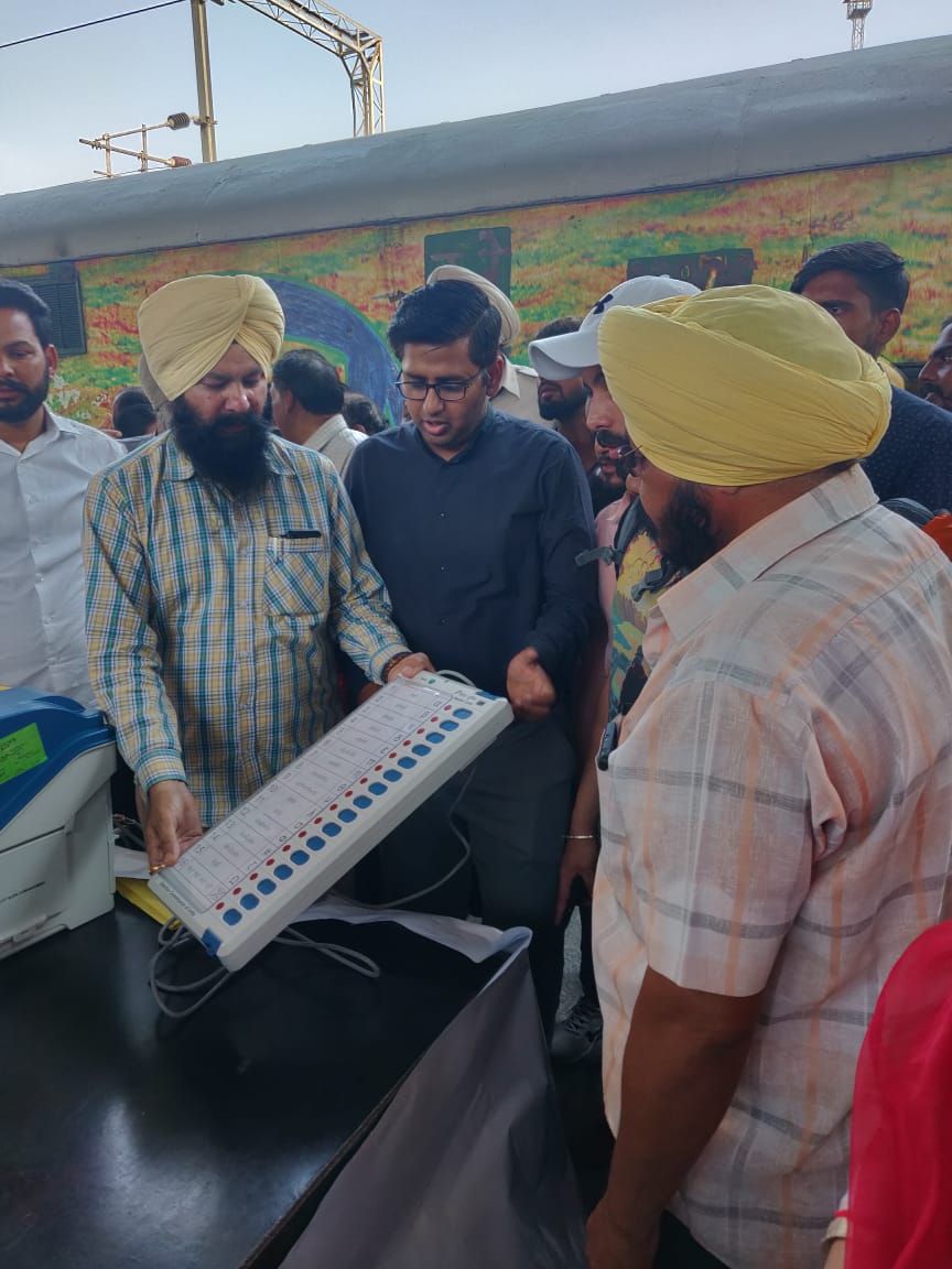 Flag off of express train at railway station Amritsar and distribution of pamphlets snd demonstration of evm and  vvpat .