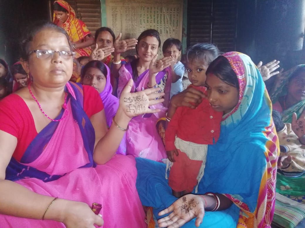 Women voters made aware by applying mehndi DEO PAKUR