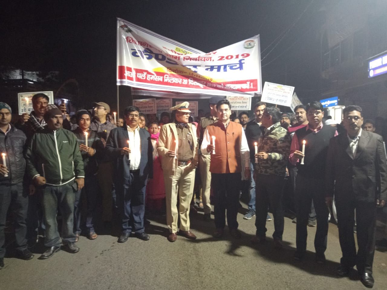 Candle march was organized to make voters aware DEO PAKUR